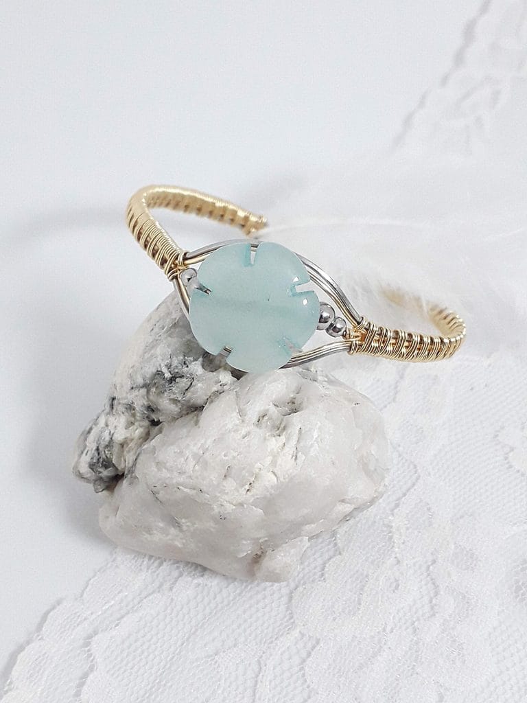 Bracelet fleur Aigue-Marine Laiton Acier Le Monde en Cy